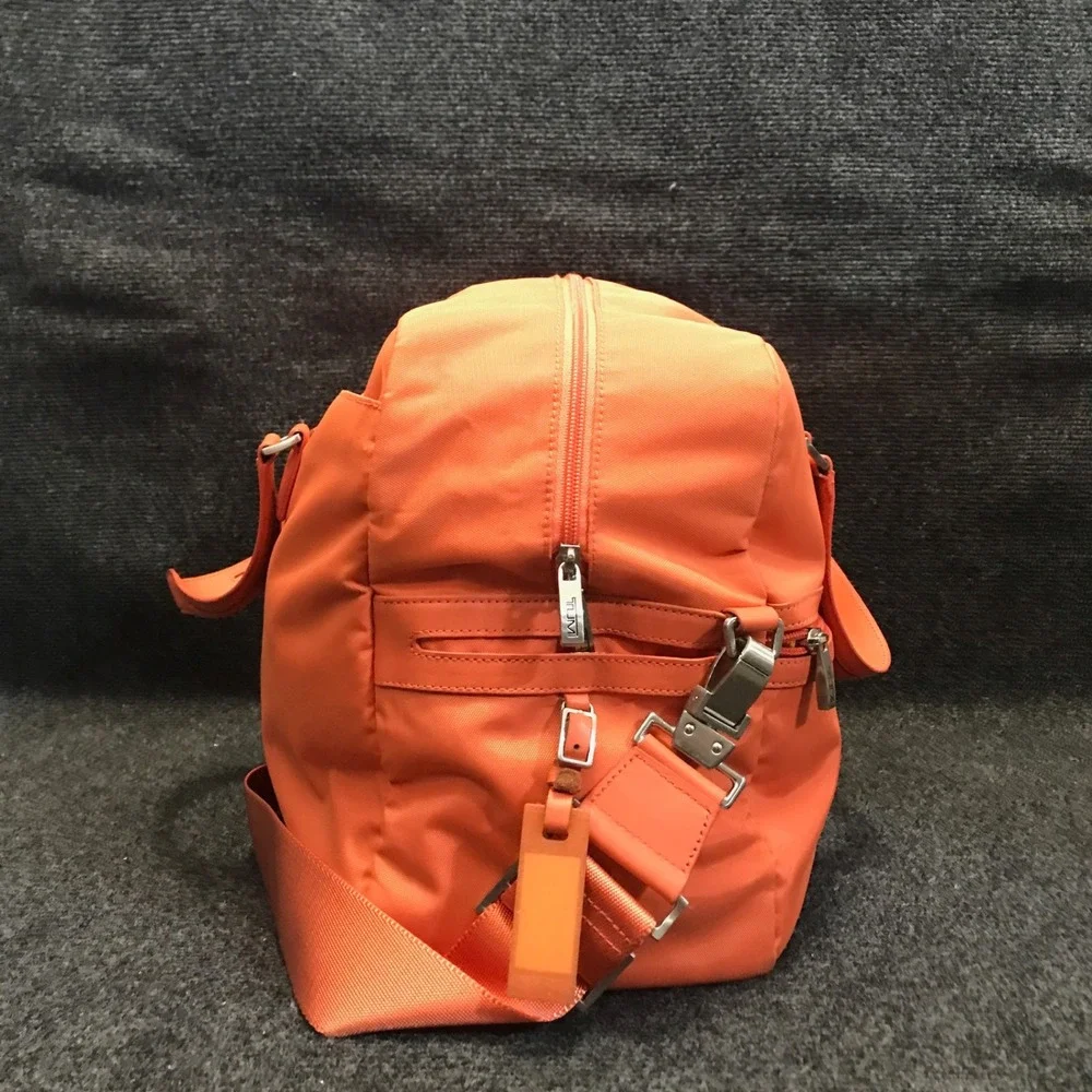 Tumi Model 4892MLN Voyageur Tangerine Nylon Weekender Travel Shoulder Duffel Bag
